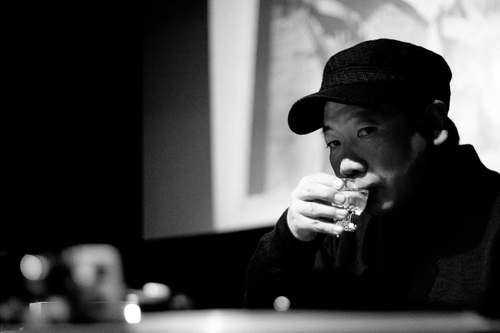 T. Mikawa